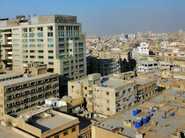 سندھ بلڈنگ، تنگ گلیوں کے چھوٹے رہائشی مکانات عمارتوں میں تبدیل